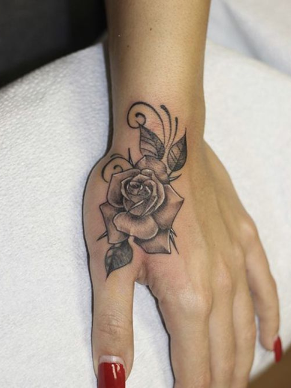 Fine-Line-Flower-Hand-Tattoo