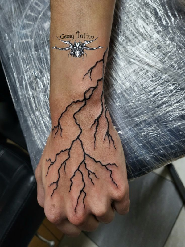 Lightning-Bolt-Hand-Tattoo