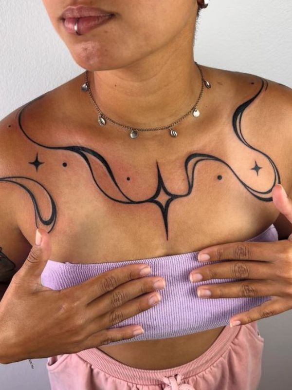 Abstract-Blackwork-Chest-Tattoo-Ideas