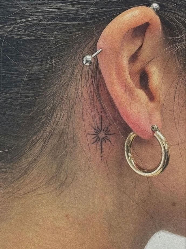 Sun-behind-ear-Tattoo