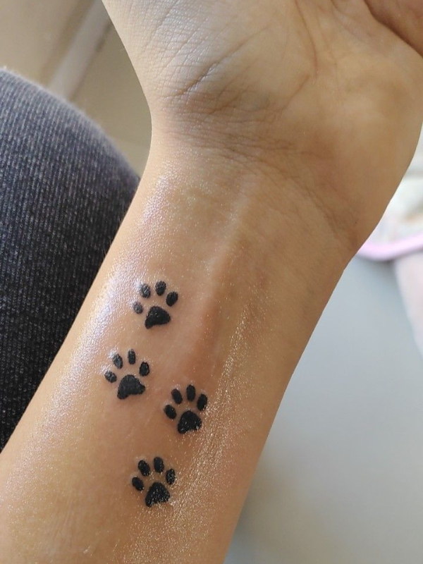 Paw-Print-Hand-Tattoo
