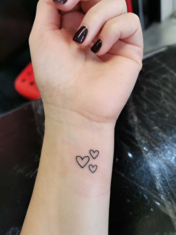 Tiny-Heart-Hand-Tattoo