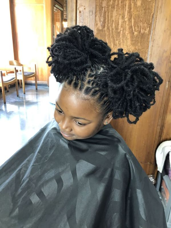 Double-Loc-Buns-With-Loose-Face-Framing-Locs